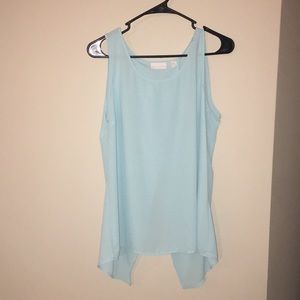 Light blue open back shirt